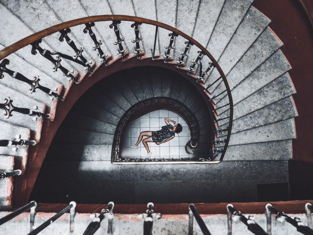 photo of woman reclining on floor