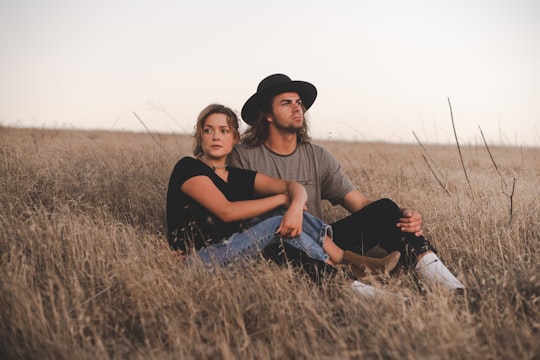 woman and man sitting on wheat field in Carlsbad United States