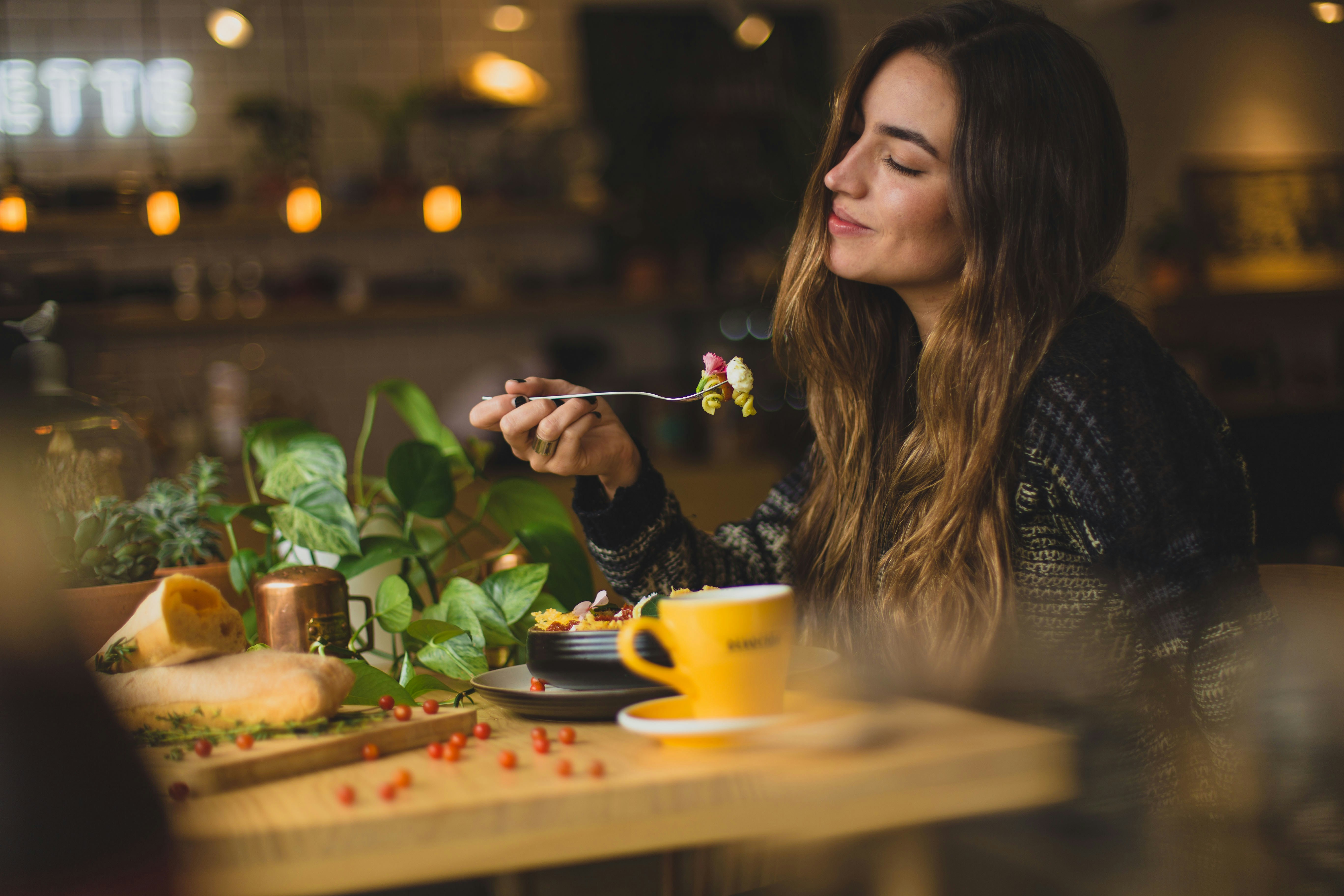 great photo recipe,how to photograph dani; woman holding fork in front table