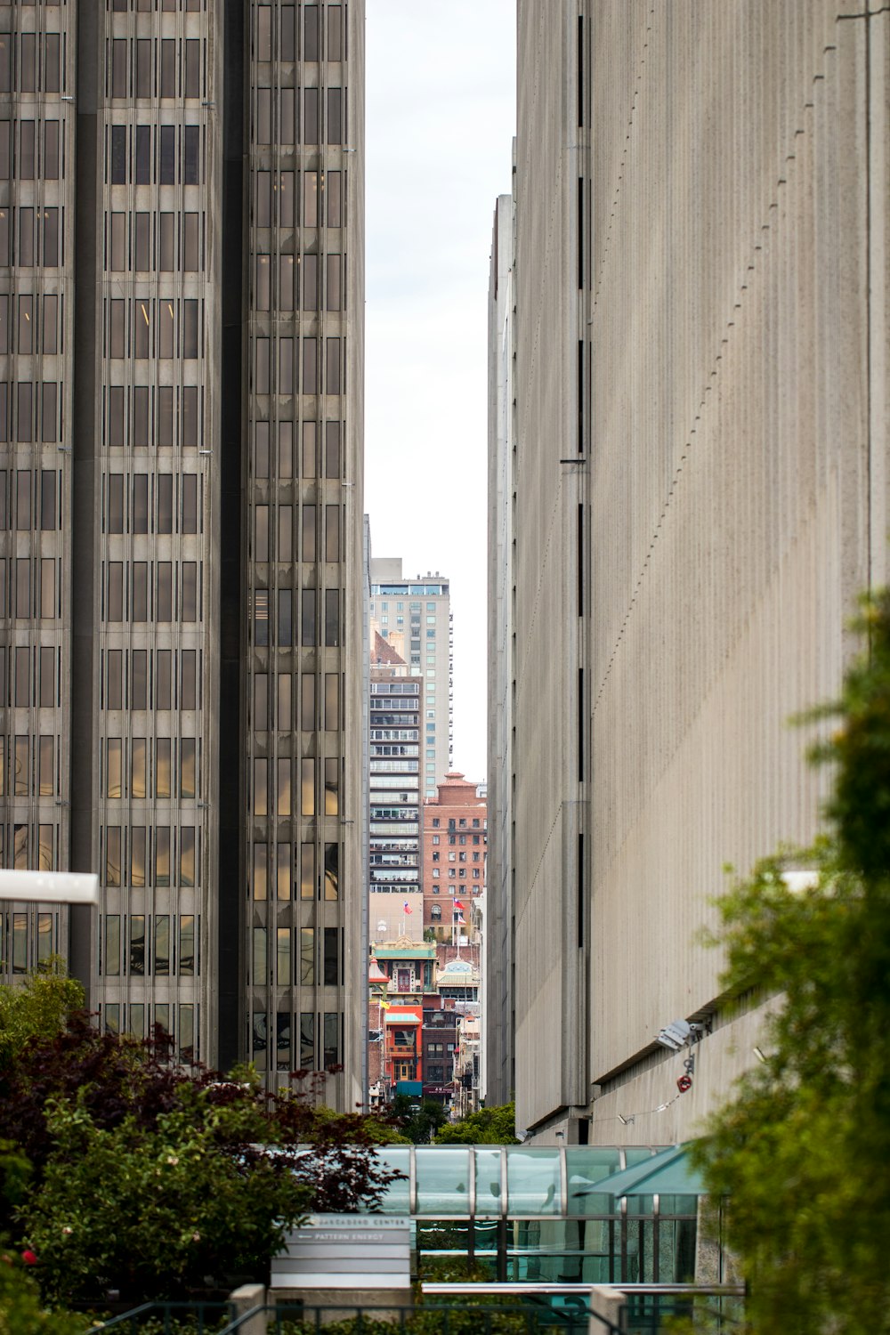 aerial crossing between two grey concrete buildings