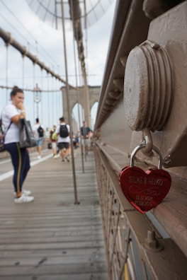 A heart-shaped lock on a bridge, representing eternal love.