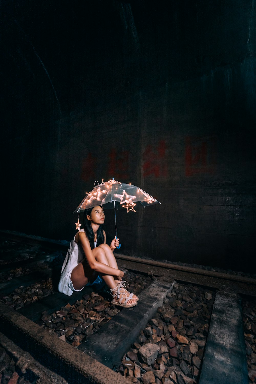 woman holding umbrella