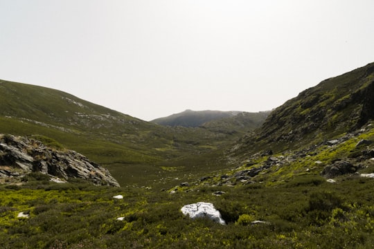 valley under white sky in Pena Trevinca Spain