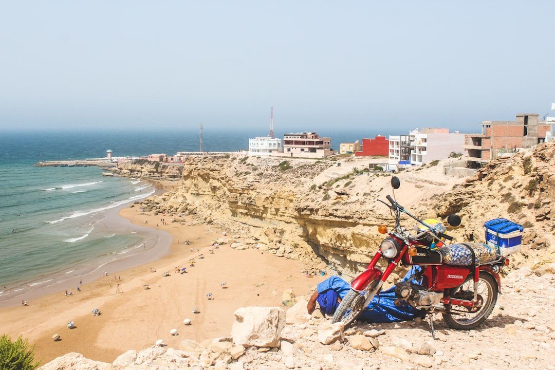 motorcycle on seashore,