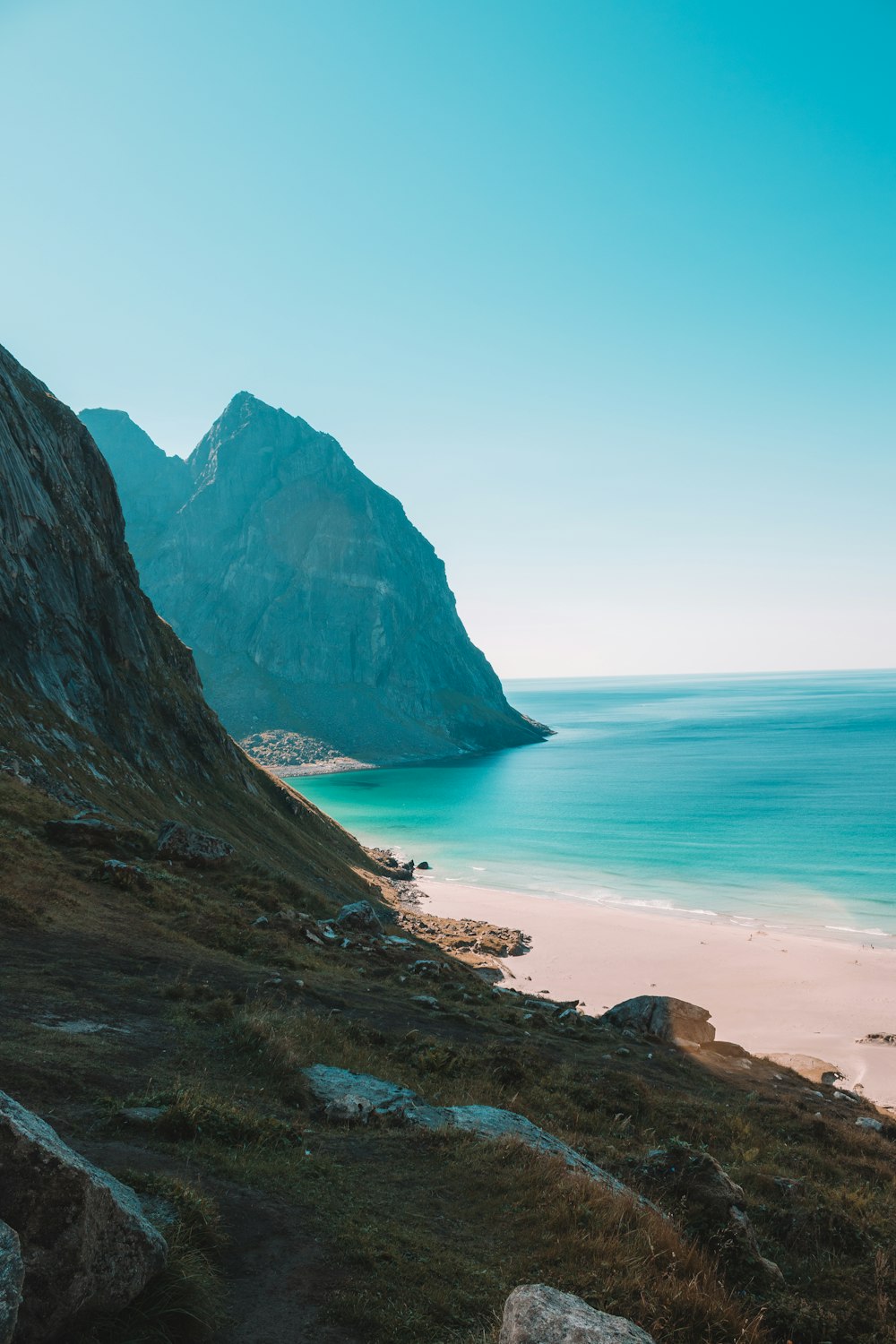 landscape photograph of beach near mountain