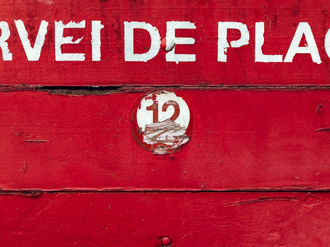 red wood board with white text, “The number twelve has important symbolism attached to it in the world’s cultures, generally representing perfection or entirety. Notably, twelve is the number of months in a year as traditionally represented both by the Western and the Chinese zodiac and the number of months in a solar calendar such as the Julian one. Ultimately, this is due to the number of full lunations in a solar year. In any case, the number twelve is recurring as the number of a “complete set” or “cosmic order” in religious, mythological and magical traditions since antiquity.”<p></figure>Source: Wikipedia