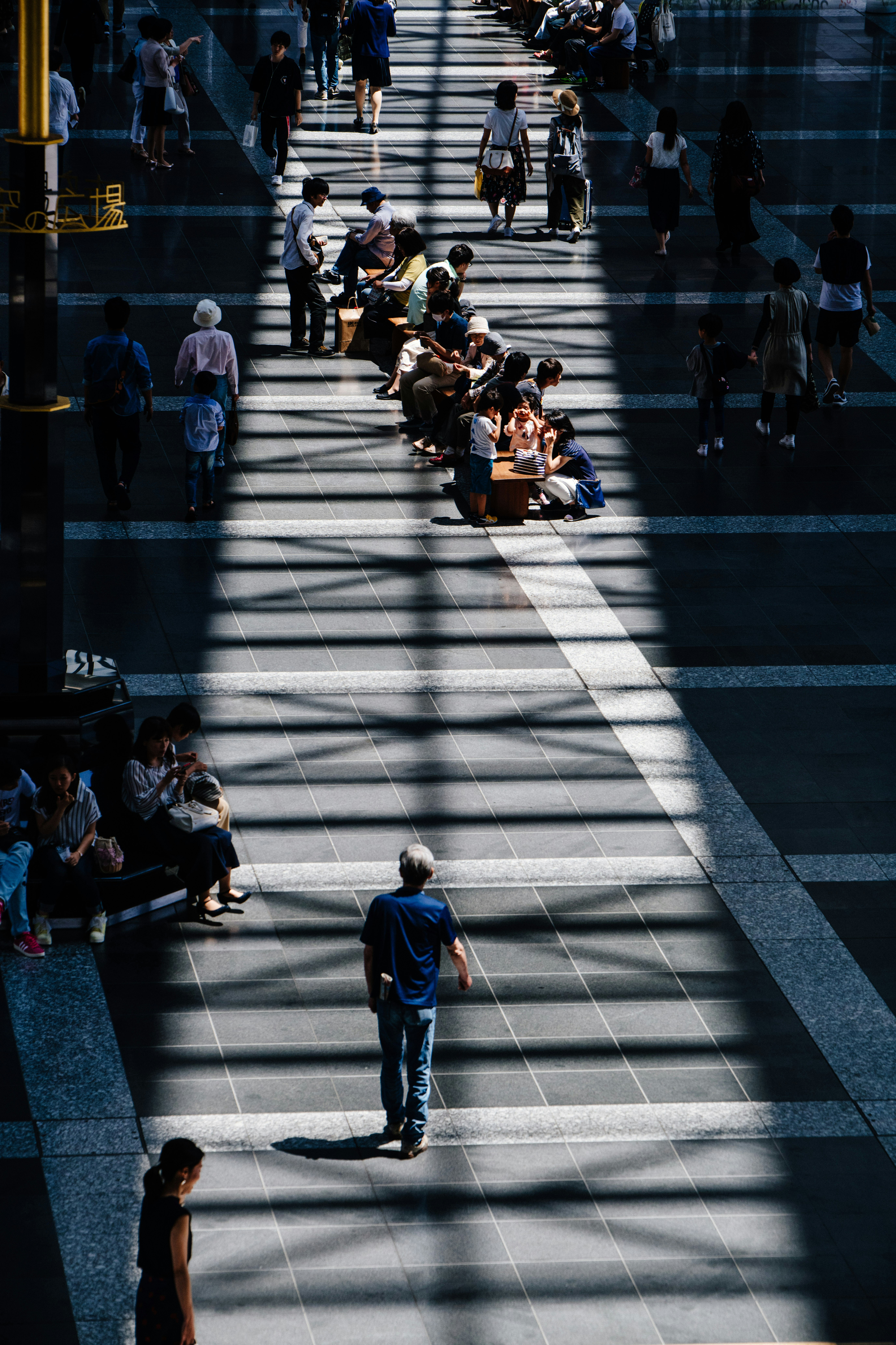 man walking on road