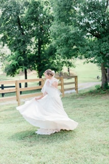 woman wearing white floral wedding gown