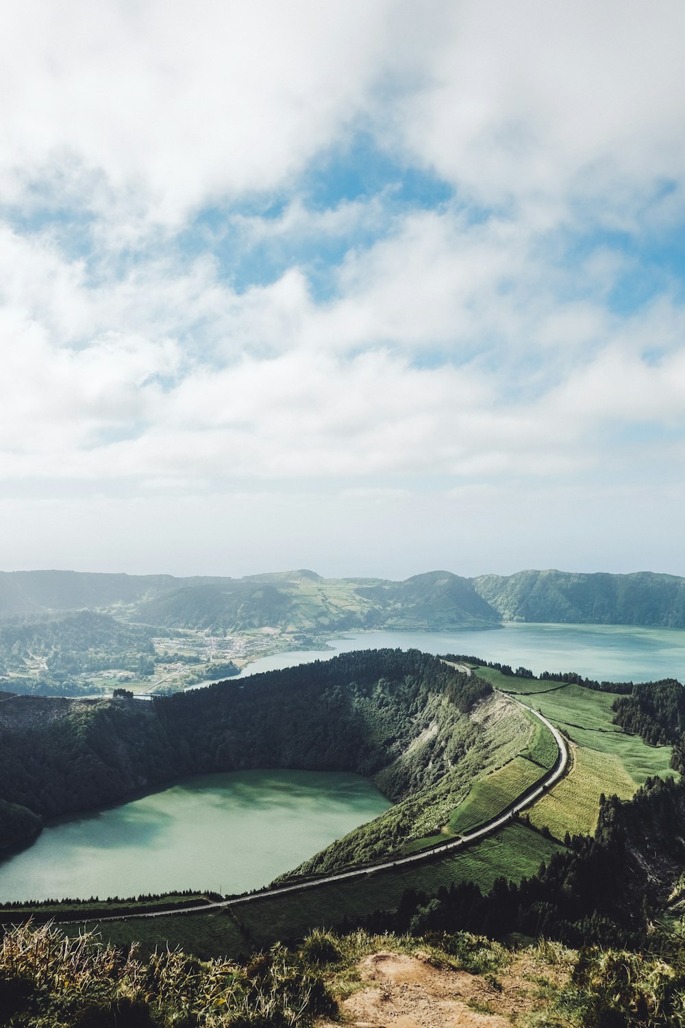 bird's-eye view of mountain under cloudy sky