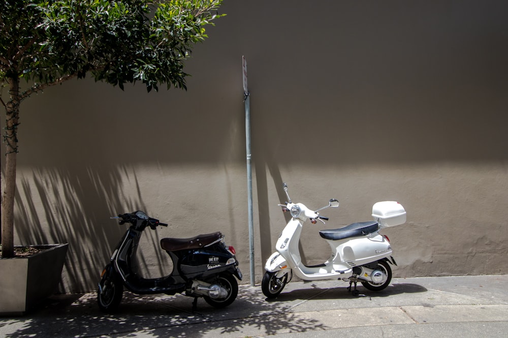 black and white motor scooter