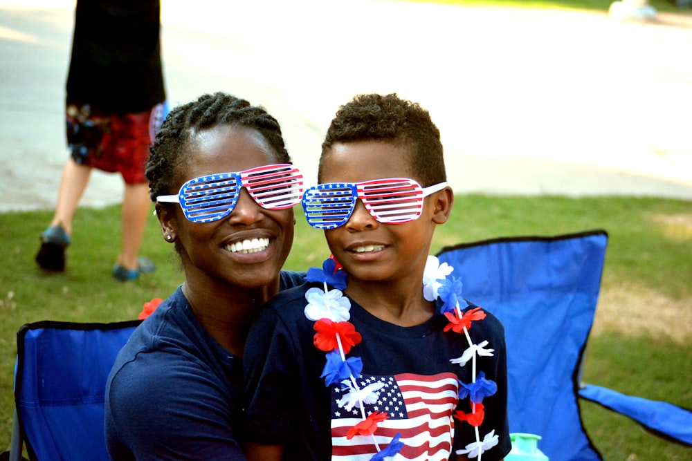 a couple of people that are wearing some sunglasses