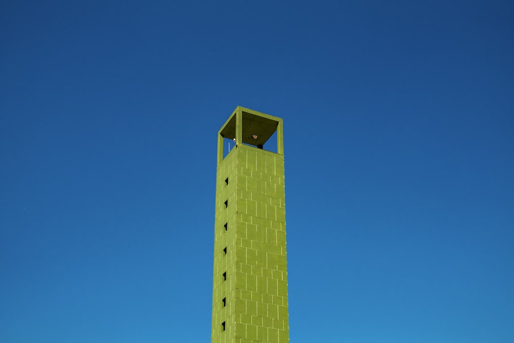 green concrete tower during daytime