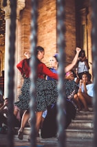 two women dancing outdoors