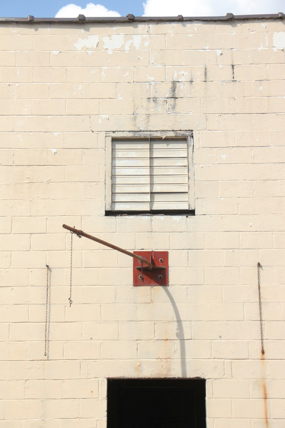 red and white metal window frame