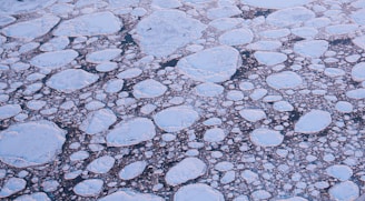 A panoramic view of frozen sea ice stretching towards the horizon near Kemi.