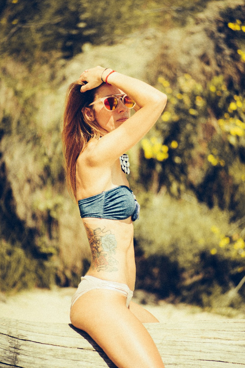 woman wearing black and white 2-piece bikini