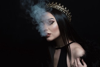 smoke coming out from woman's mouth
