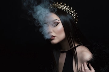 smoke coming out from woman's mouth