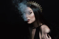 smoke coming out from woman's mouth