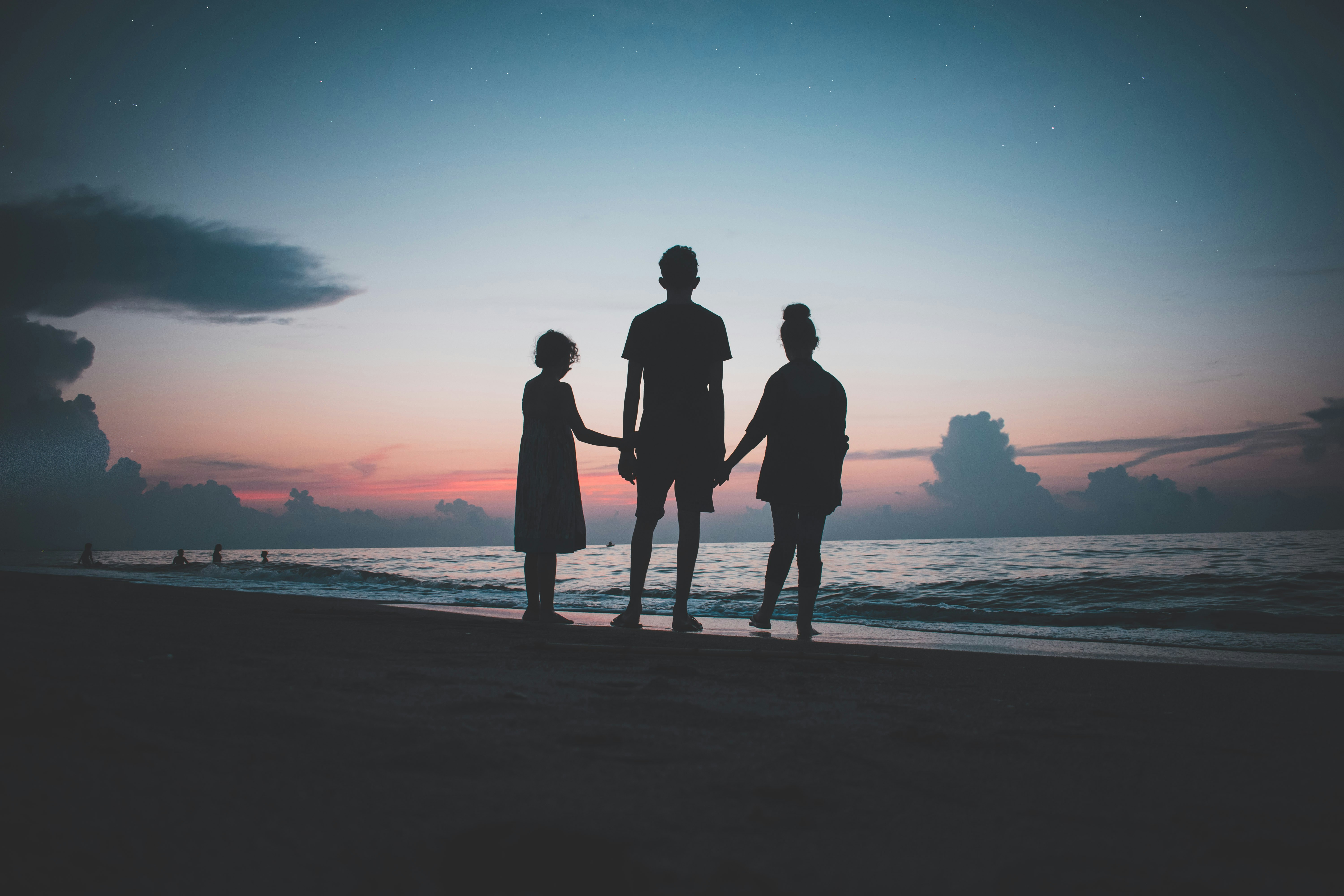 Diverse family practicing meditation