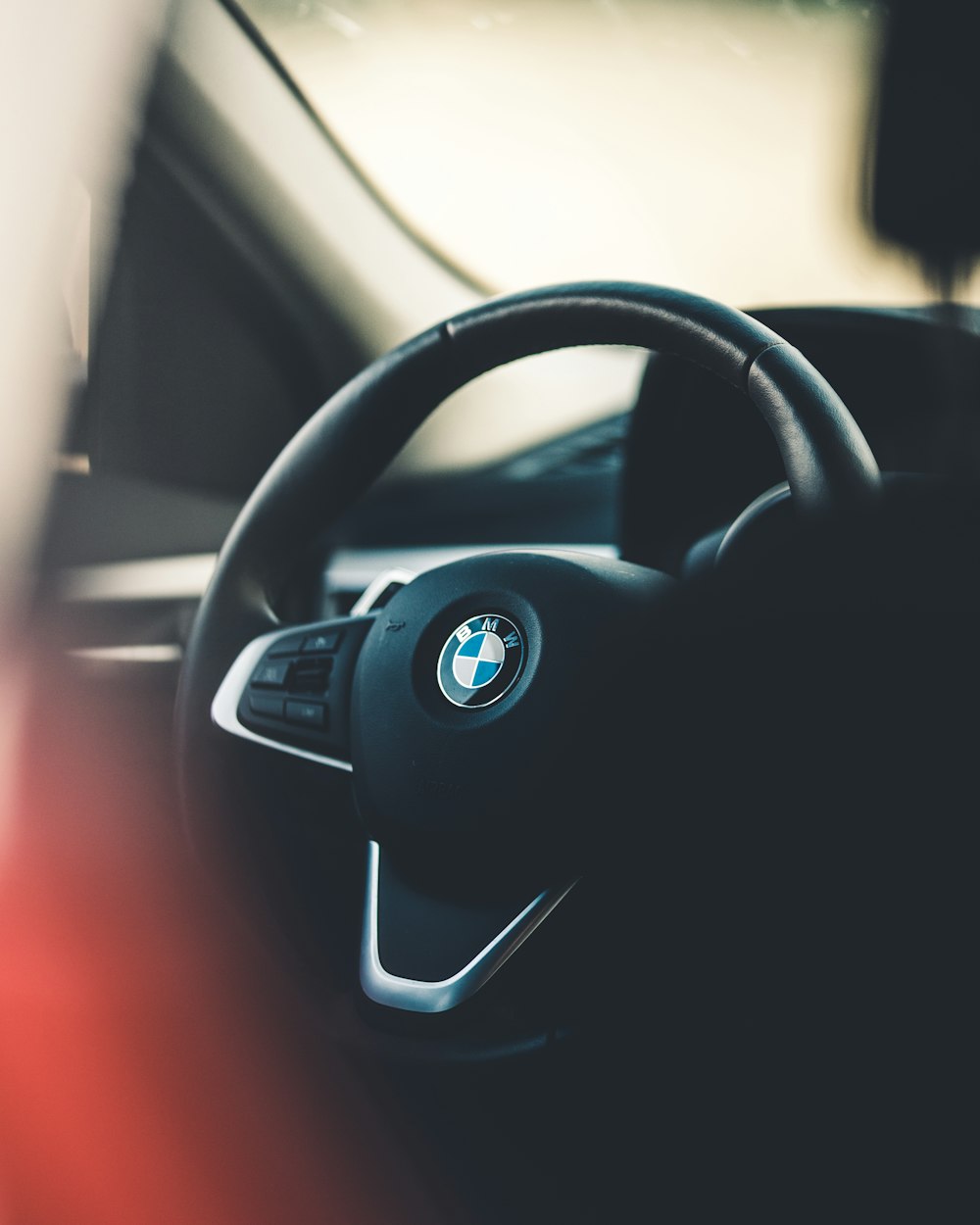 black BMW steering wheel