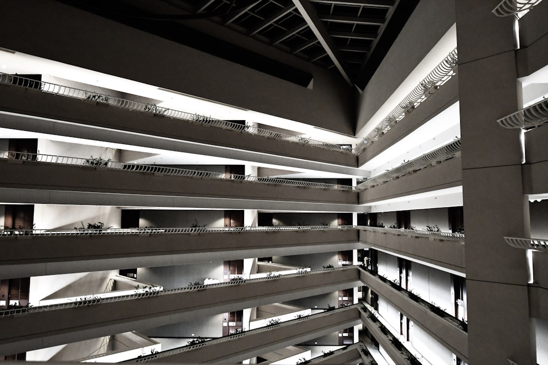 white structural building, I was staying at this hotel for the night and was walking along the corridors. Just fell in l