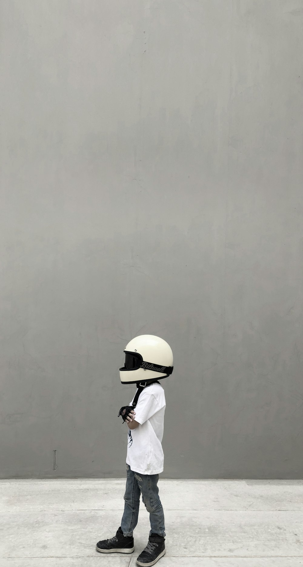 boy wearing full-face helmet