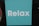 A turquoise square background with the word 'Relax' written in bold, white letters. The background is simple and plain, creating a minimalist appearance.