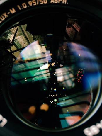 An artistic shot of traditional Moroccan patterns reflected in a camera lens.