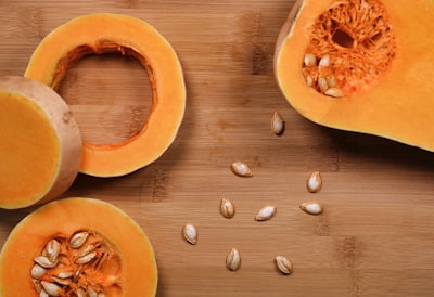 sliced pumpkin on brown wooden surface squash zoom background