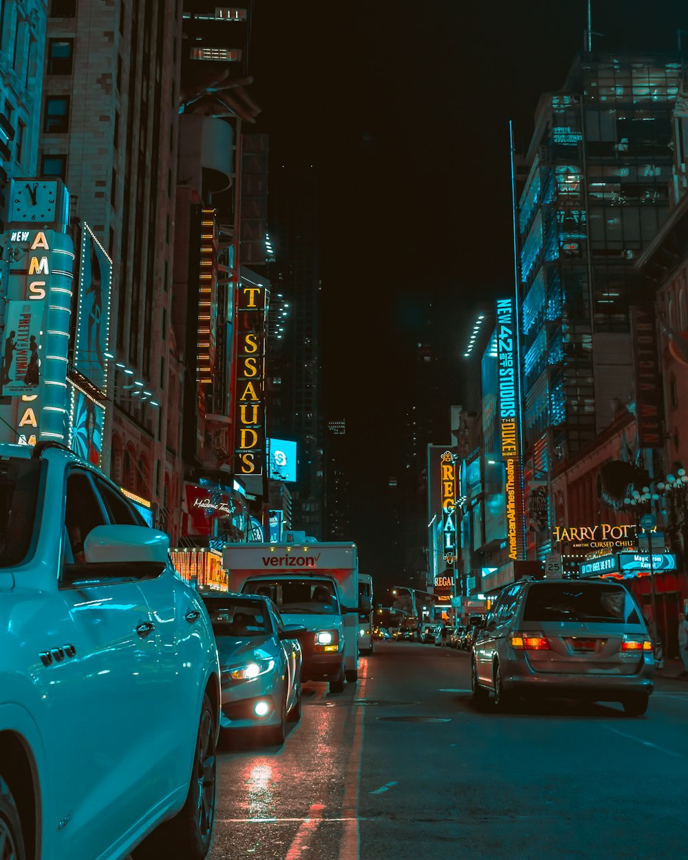 city skyline under black sky during nighttime