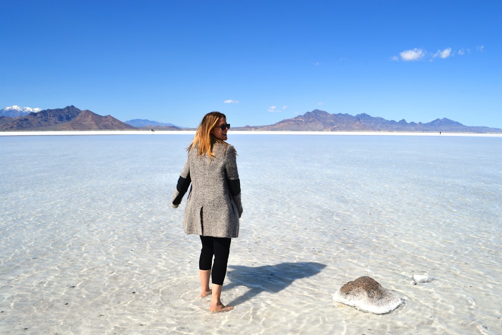 woman standing on seashore