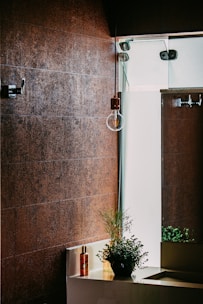 a bath room with a sink and a mirror