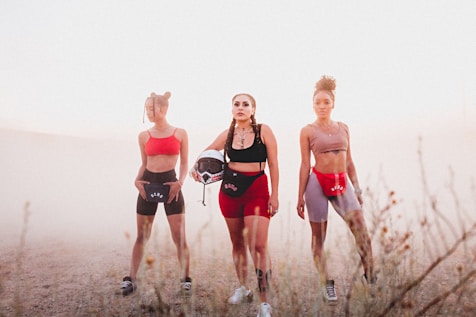 three woman standing next to each other