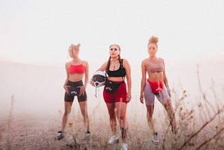 three woman standing next to each other