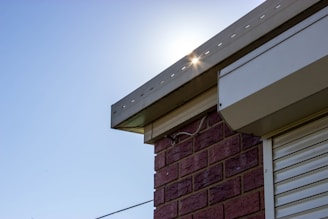 Close-up of custom metal flashing installed on a commercial building.
