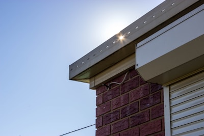 Close-up of custom metal flashing installed on a commercial building.