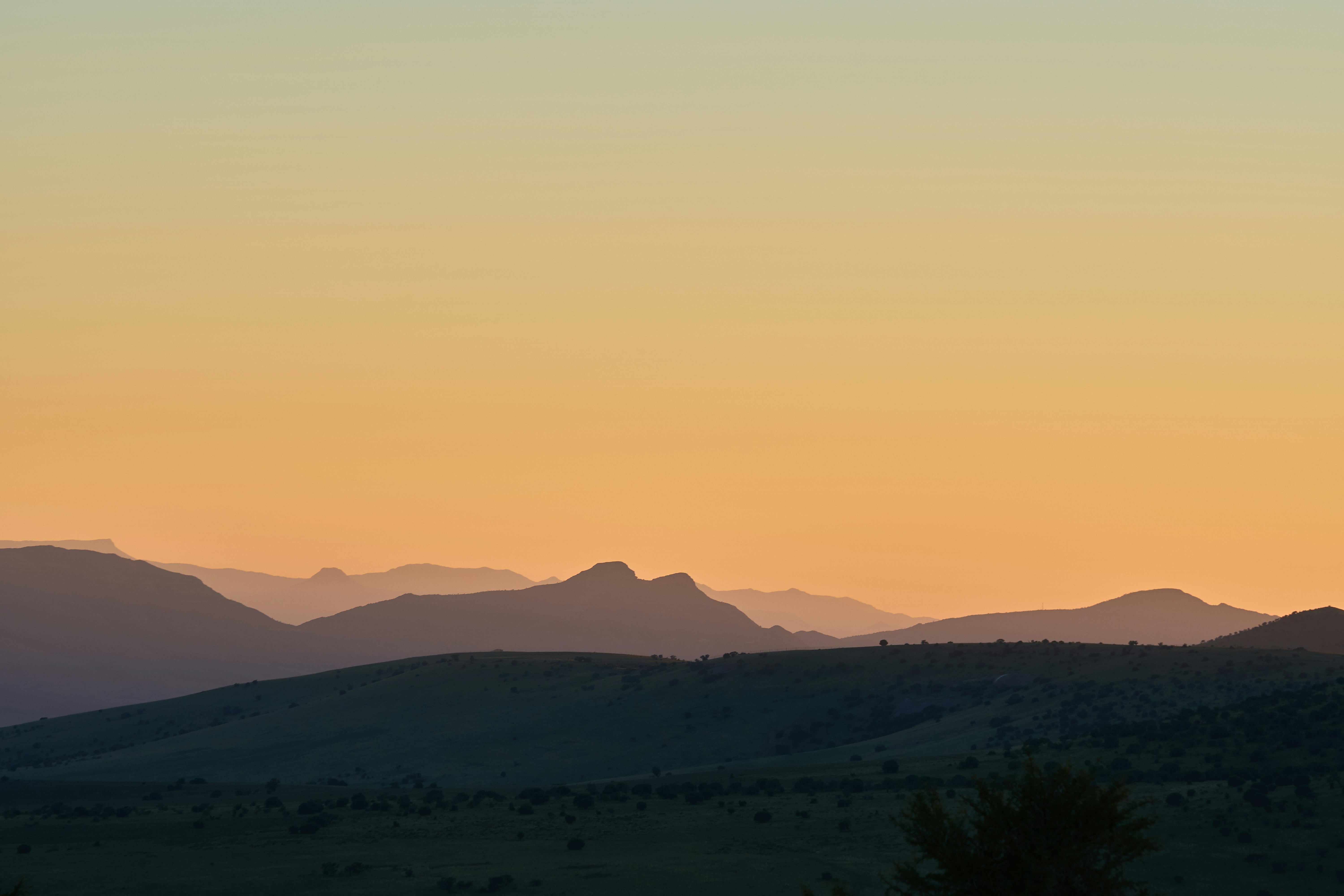 landscape photography of mountains and plain