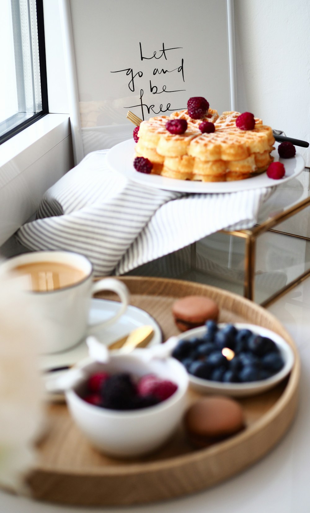 shallow focus photography of waffles with raspberries