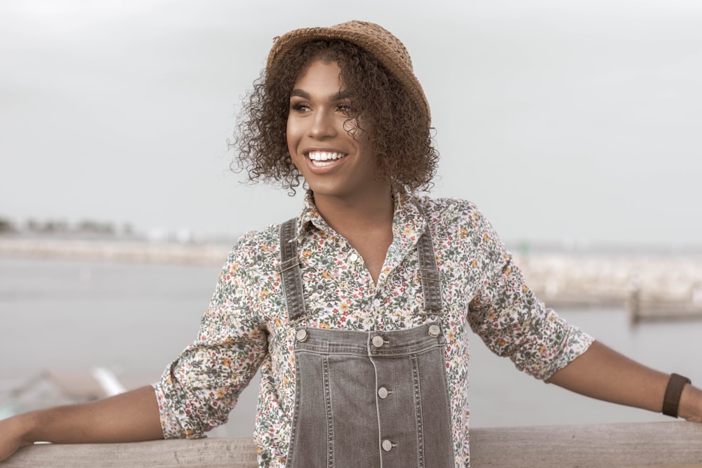 woman in gray overalls