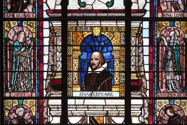 An artistic representation of Shakespeare's famous plays on parchment.