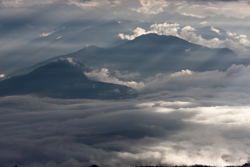 mountain range covered in clouds