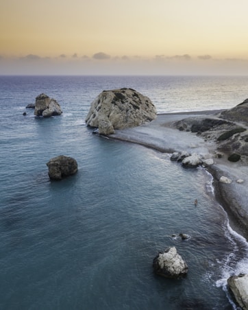 aerial photography of seashore beside body of water