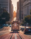 grey cable car between buildings