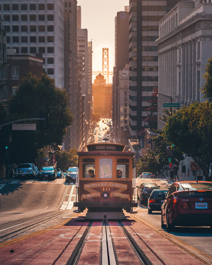grey cable car between buildings