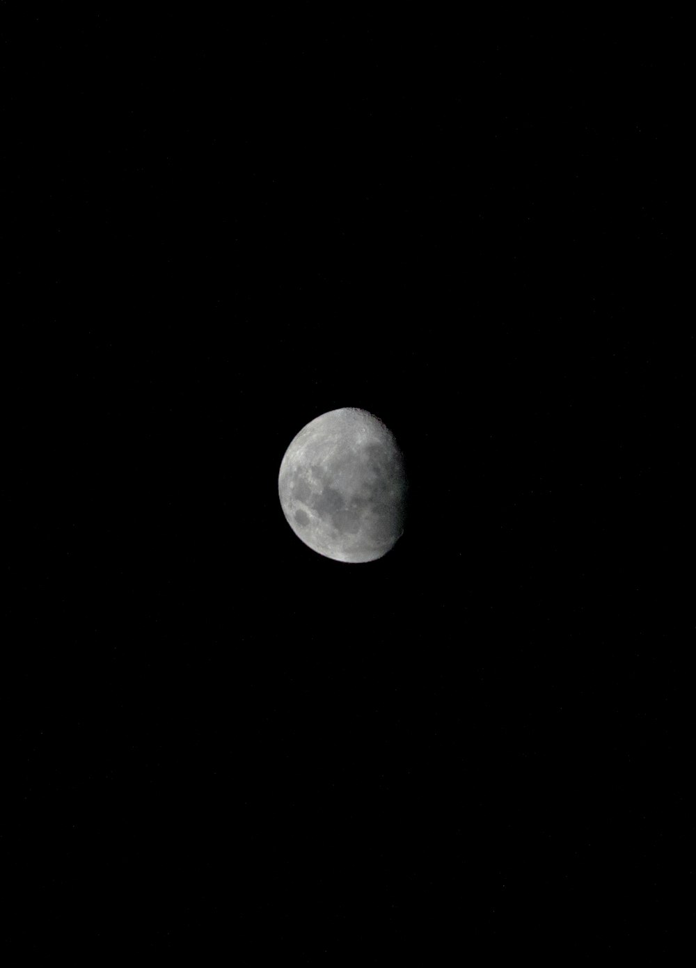 waxing moon in night sky