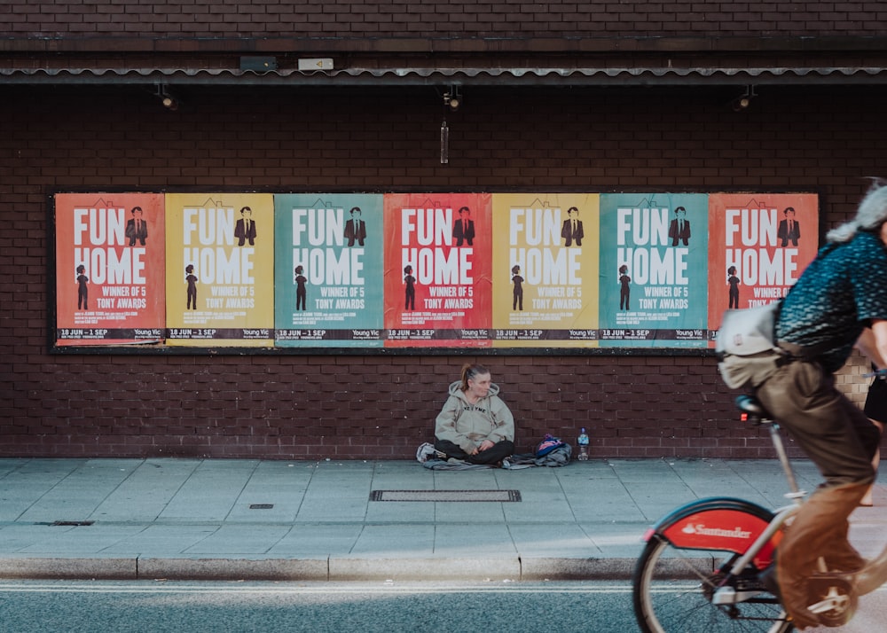 person sitting on street