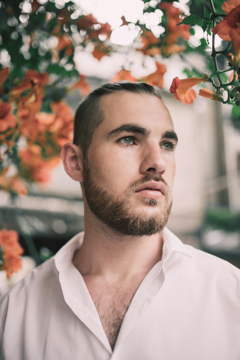 selective focus photograph of man in white dress shirt