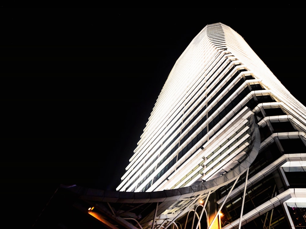 low angle photography of concrete building at nighttime