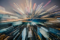 A nighttime cityscape filmed with AI-enhanced drones, highlighting precision and innovation in production.